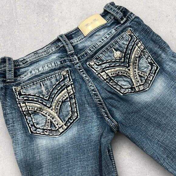 โ
Miss Me Signature Taylored Boot Cut Rhinestone - Studded Design Denim Jeans โ
- Picture 2 of 8